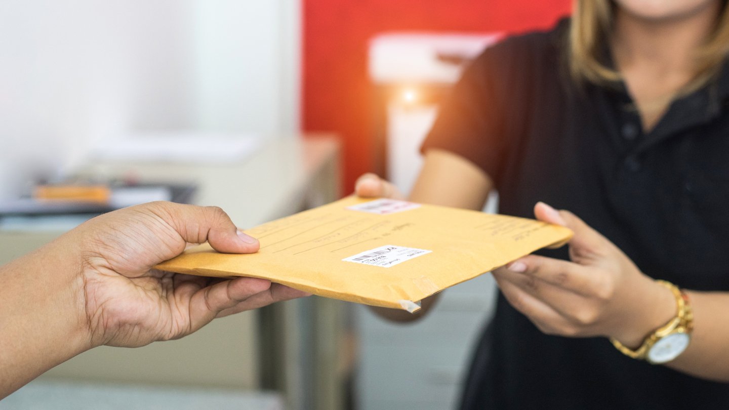 Post-office-work-taking-parcel-1140x810