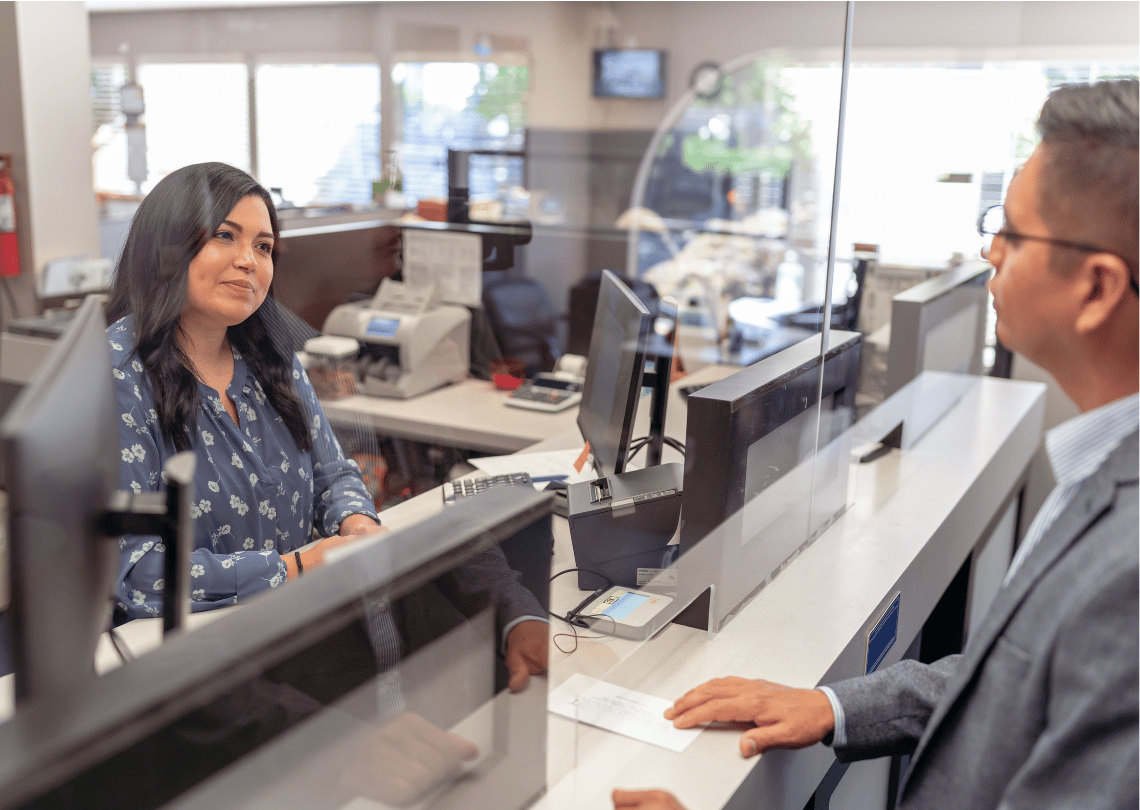 Woman Bank Window_1140x810