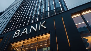 Fachada de um banco com detalhes arquitetônicos sofisticados e o nome 'BANK' em destaque. Ideal para temática financeira.