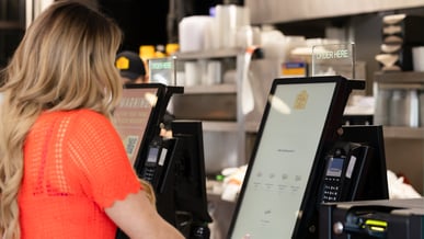 Glory-1440x810-self-service-kiosk-blonde-lady